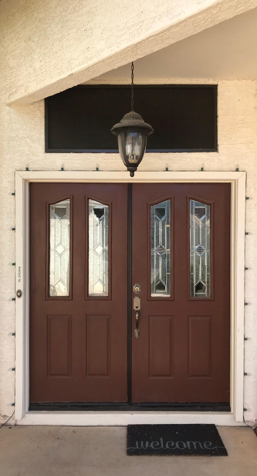 Front door before being painted black