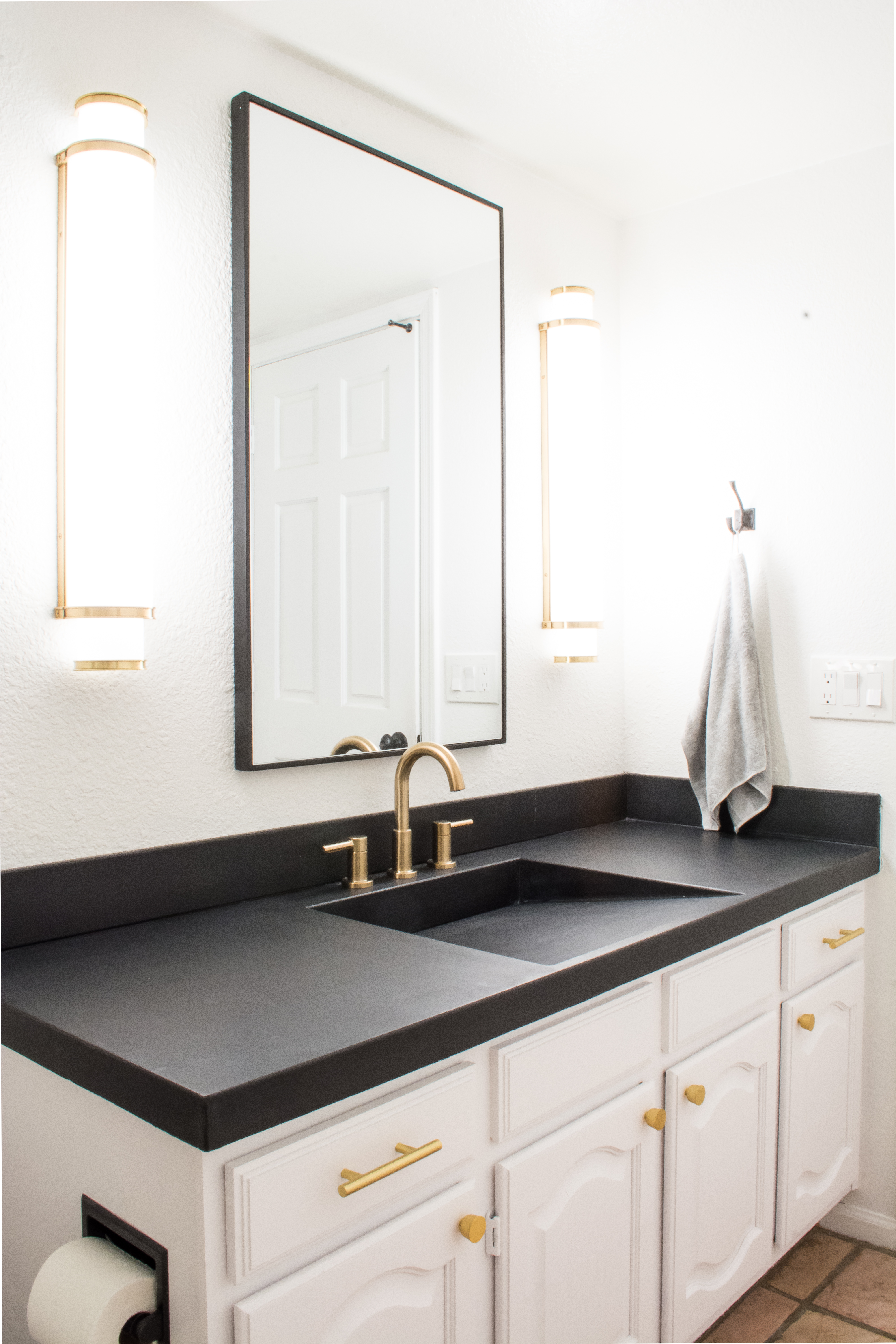 Easy DIY Builder Grade Bathroom Update | Part II: The Design Process, Brass Faucet, Brass hardware, Black framed mirror, white walls