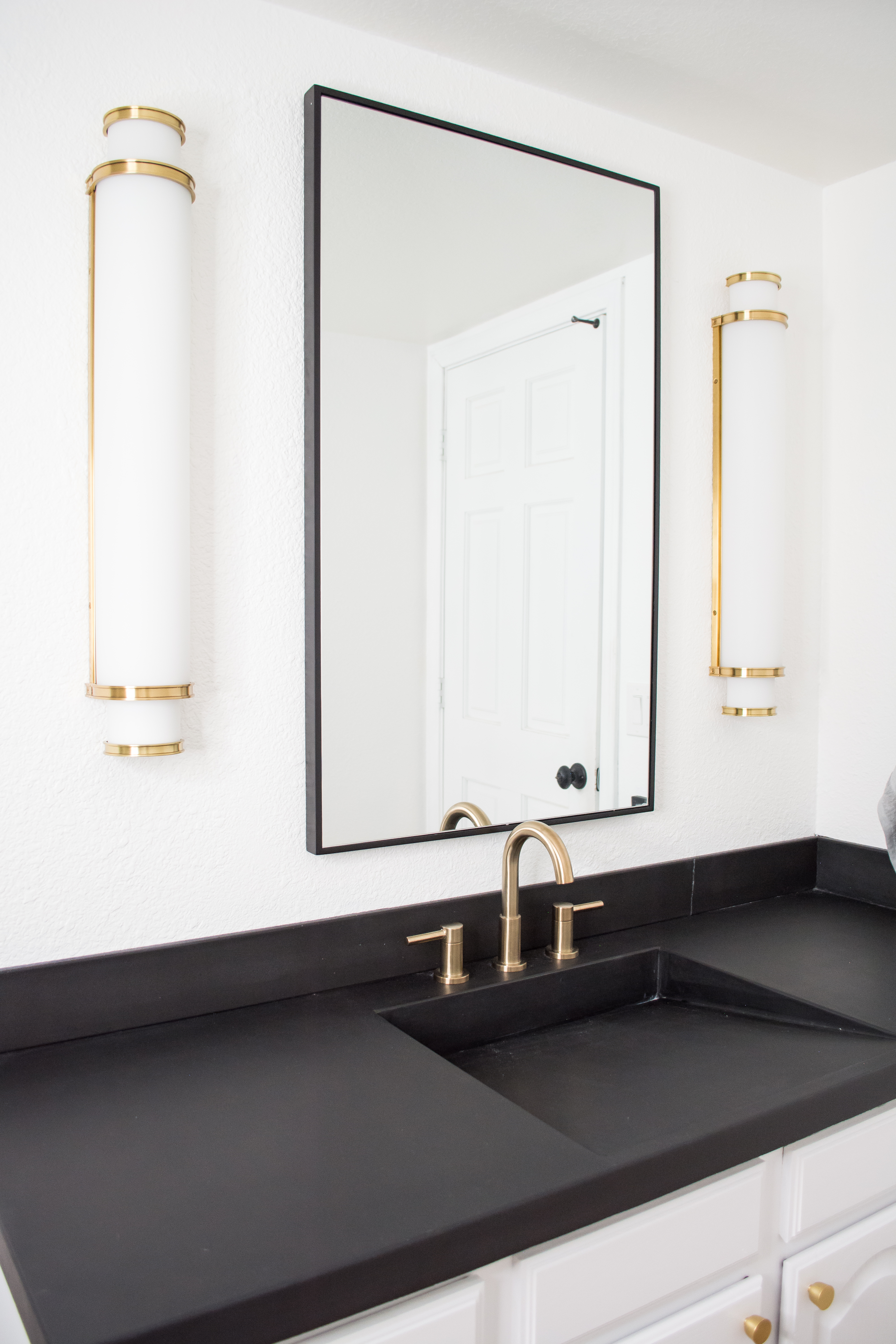 Easy DIY Builder Grade Bathroom Update | Part II: The Design Process, Brass Faucet, Brass hardware, Black framed mirror, white walls